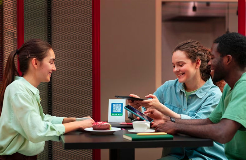 A person using the Ramad Pay app on their phone